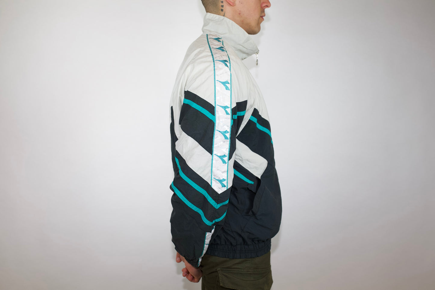 VINTAGE DIADORA 'LIGHT YOUR FIRE' WHITE NAVY GREEN SPRAY JACKET (XL)